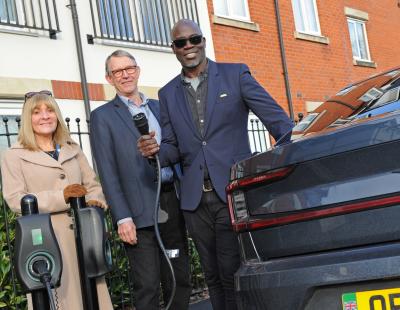 Image of Cabinet member for sustainability and climate change, Cllr Janet Henshaw; Chair of Warrington Climate Emergency Commission, Cllr David Ellis; and Martin Offiah launching the new EV charging points on Gladstone Street