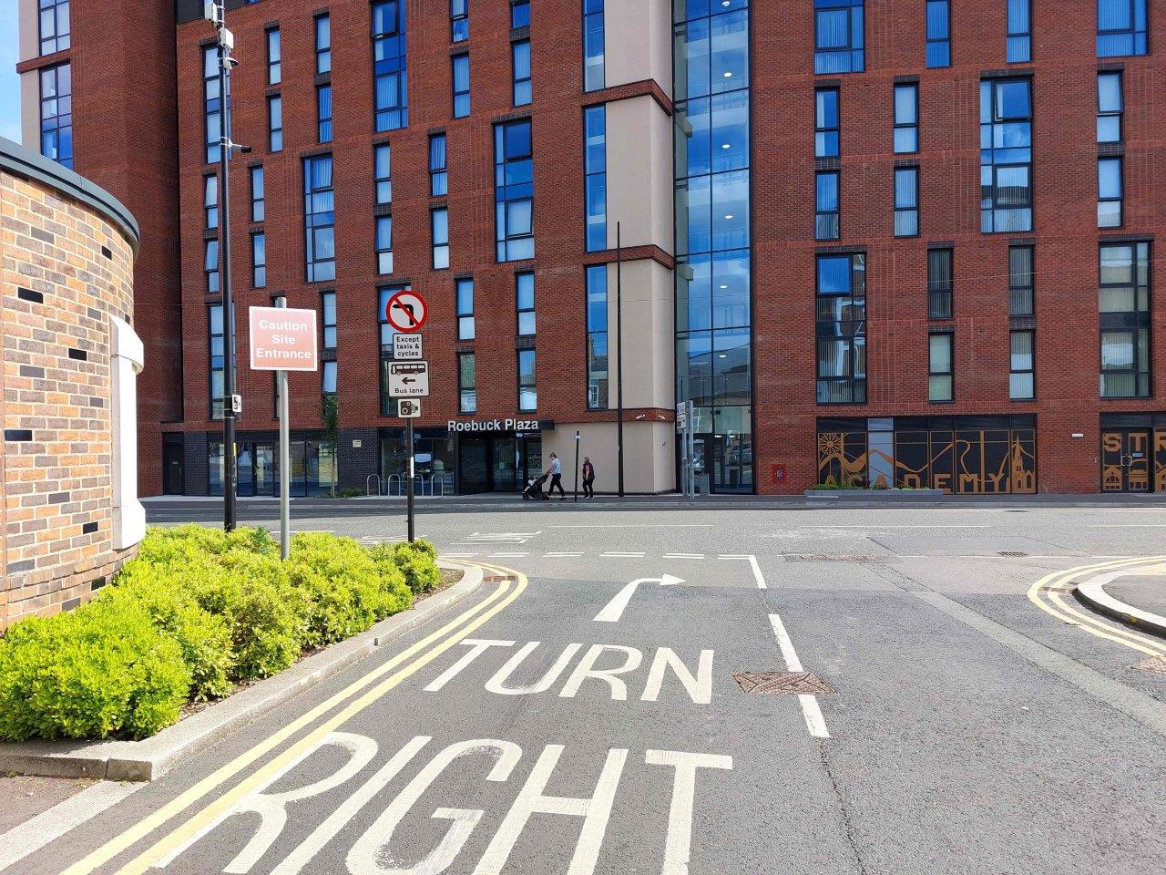Academy Street bus lane - Bus lane road markings when leaving the Time Square ground level carpark