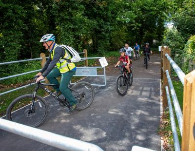 Image of cyclist of all ages using the upgraded Trans Pennine Trail path in Lymm.