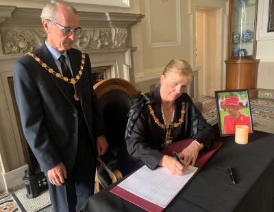 The Mayor of Warrington signs book of condolence