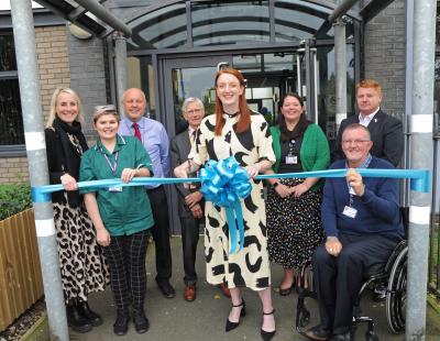 Charlotte Nichols MP cuts the ribbon at the health and social care academy opening event