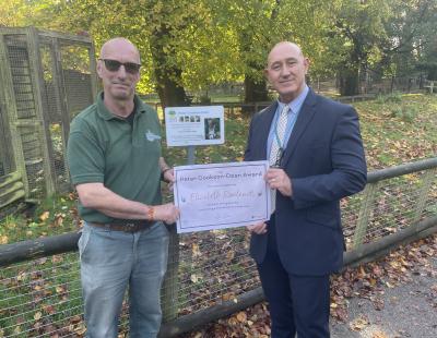 Peter Cookson-Dean being awarded for his 40 years of service with Estate Manager for Walton Hall and Gardens, Neil Simpson