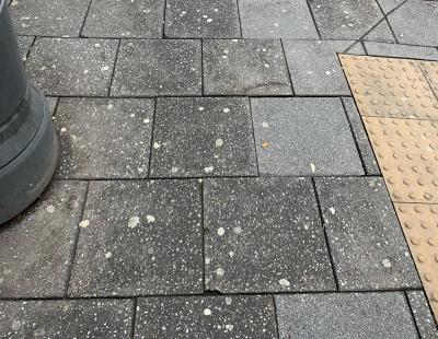 Image of chewing gum stains on the pavement on Lower Bridge Street in Warrington town centre.