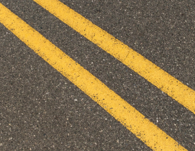 Close-up image of double yellow lines