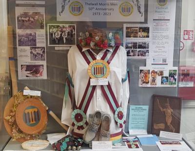 Image of a collection of memorabilia of the Thelwall Morris Men.
