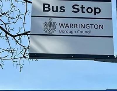 Close up image of Warrington bus stop sign.